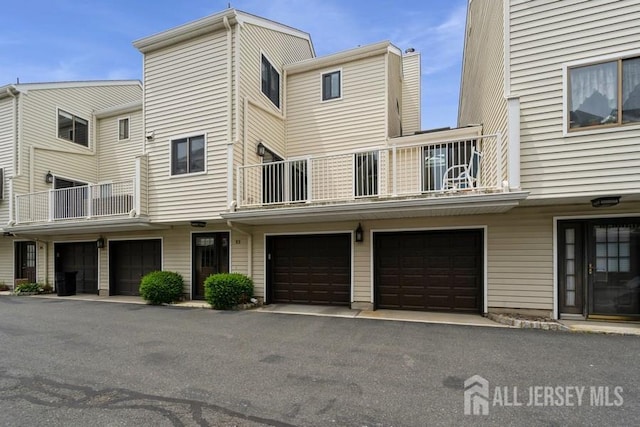 580 Patten Ave Unit 53, Long Branch, NJ 07740 - view of building exterior with a garage