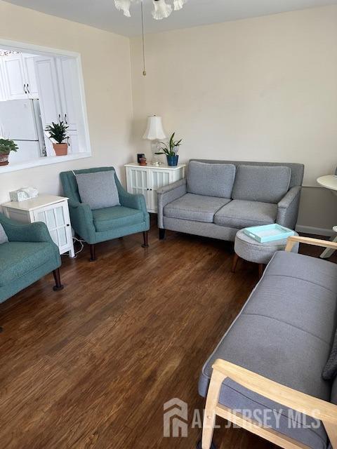 68 Suydam Ave, Edison, NJ 08817 - living area with dark wood-type flooring