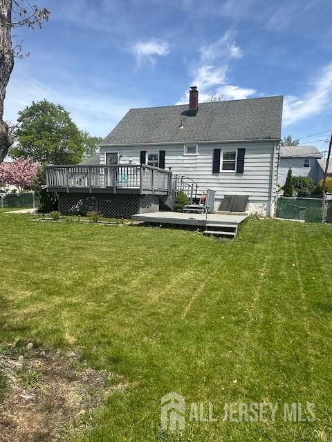 68 Suydam Ave, Edison, NJ 08817 - back of house featuring a deck, a chimney, and a shingled roof