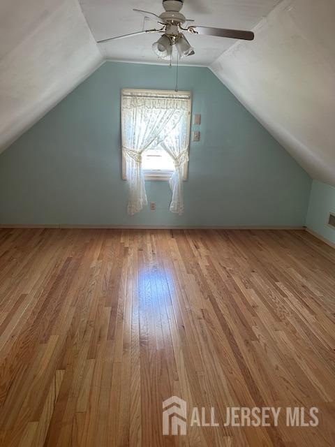 68 Suydam Ave, Edison, NJ 08817 - bonus room featuring hardwood / wood-style flooring, vaulted ceiling, and a ceiling fan