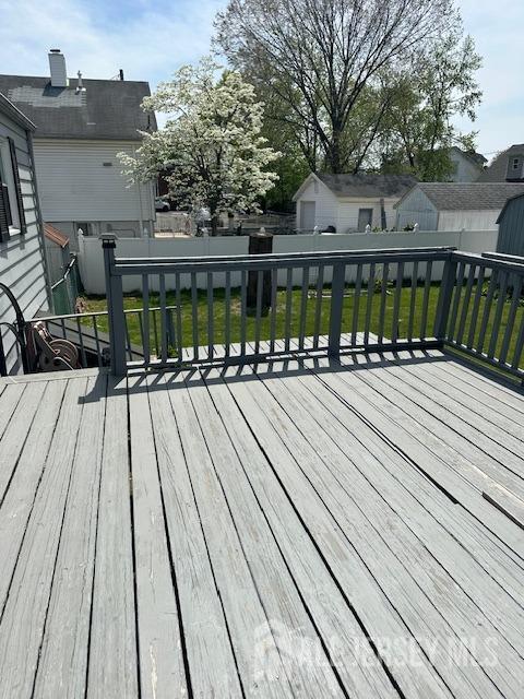 68 Suydam Ave, Edison, NJ 08817 - wooden terrace with a fenced backyard