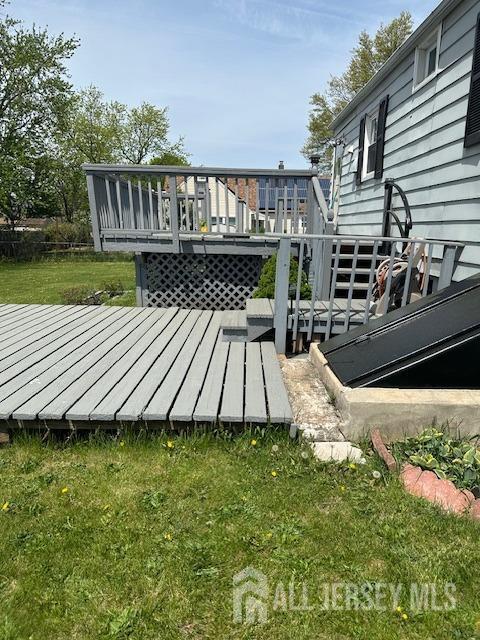 68 Suydam Ave, Edison, NJ 08817 - wooden deck with a yard