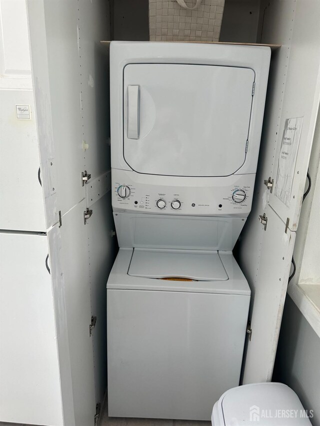 68 Suydam Ave, Edison, NJ 08817 - washroom with stacked washer / drying machine