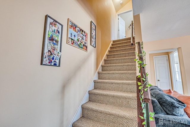 staircase with baseboards