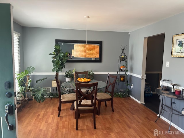 8 Bristol Dr, North Brunswick, NJ 08902 - dining area featuring wood finished floors