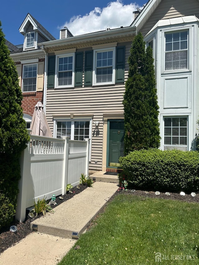 8 Bristol Dr, North Brunswick, NJ 08902 - view of property with a chimney