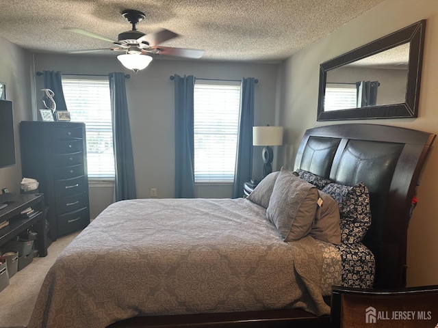 8 Bristol Dr, North Brunswick, NJ 08902 - bedroom with carpet flooring, a textured ceiling, and a ceiling fan