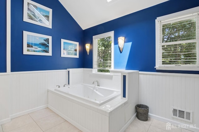 3 Cedar Ln, Milltown, NJ 08850 - full bathroom featuring wainscoting, tile patterned floors, a jetted tub, and lofted ceiling