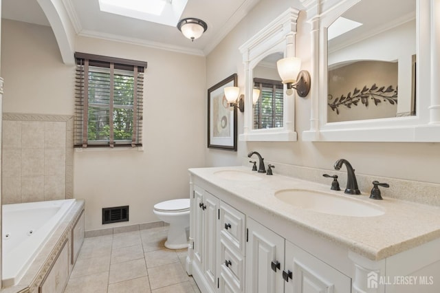 3 Cedar Ln, Milltown, NJ 08850 - bathroom with double vanity, a jetted tub, crown molding, a skylight, and tile patterned flooring