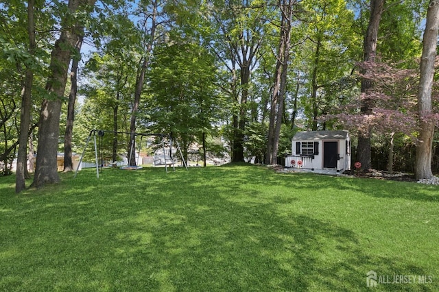 3 Cedar Ln, Milltown, NJ 08850 - view of green lawn featuring a storage shed
