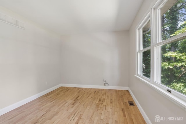 3 Cedar Ln, Milltown, NJ 08850 - empty room featuring light wood-style flooring and baseboards