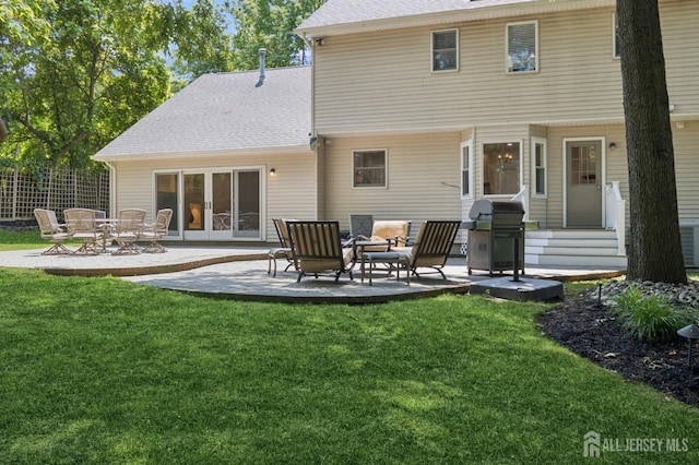 3 Cedar Ln, Milltown, NJ 08850 - rear view of house with a patio area and roof with shingles