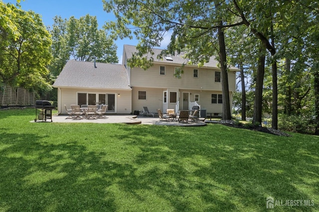 3 Cedar Ln, Milltown, NJ 08850 - rear view of house with a patio and a lawn