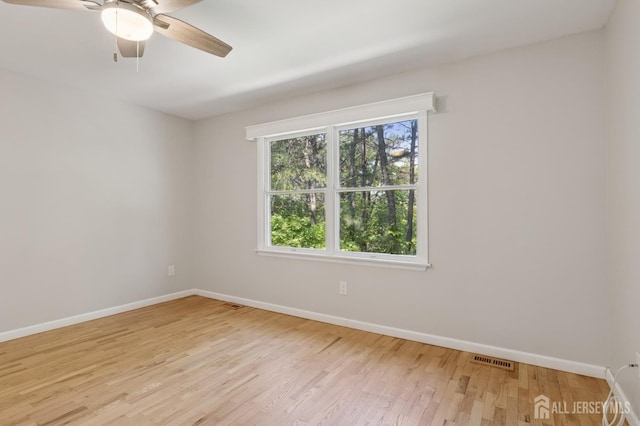 3 Cedar Ln, Milltown, NJ 08850 - unfurnished room featuring light wood-style flooring and ceiling fan