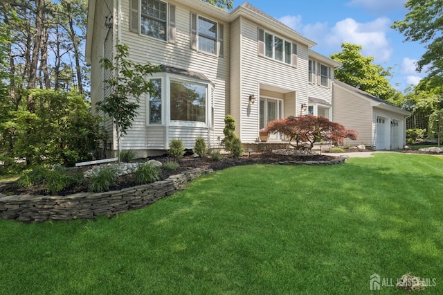 3 Cedar Ln, Milltown, NJ 08850 - view of front of property with a front yard and a garage