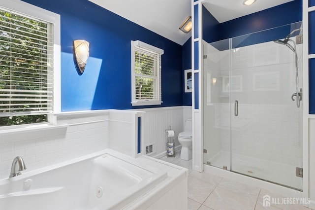 3 Cedar Ln, Milltown, NJ 08850 - full bath featuring a stall shower, a jetted tub, tile patterned floors, and wainscoting