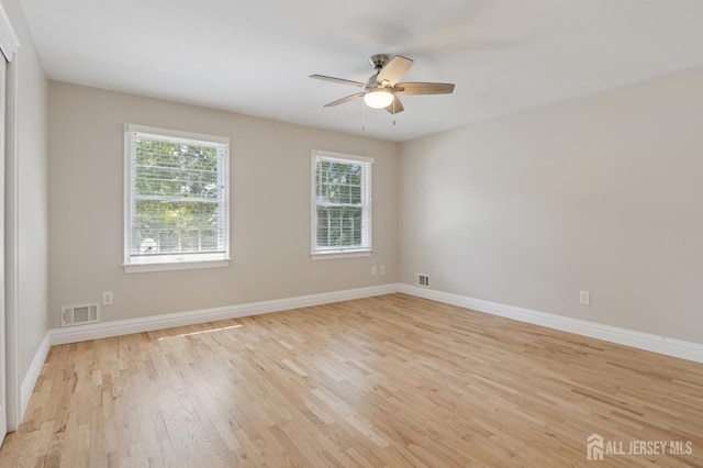 3 Cedar Ln, Milltown, NJ 08850 - spare room with light wood finished floors and ceiling fan