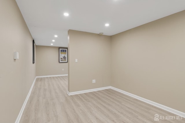 3 Cedar Ln, Milltown, NJ 08850 - empty room with light wood-style floors, recessed lighting, and a smoke detector
