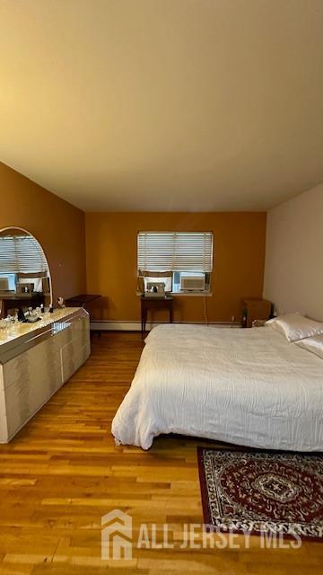 46 Gramercy Gdns, Middlesex, NJ 08846 - bedroom with wood finished floors and cooling unit