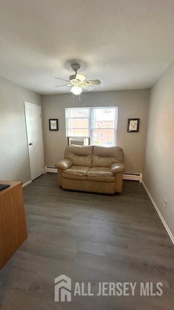 46 Gramercy Gdns, Middlesex, NJ 08846 - living area with a baseboard heating unit, baseboards, dark wood-style flooring, and ceiling fan