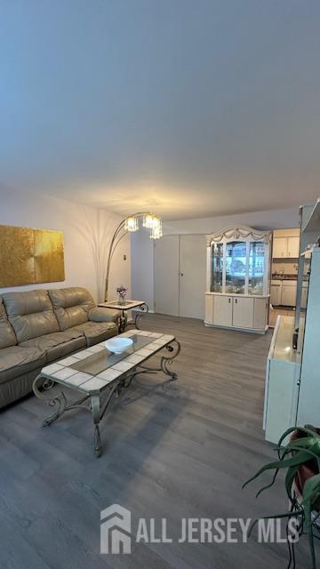 46 Gramercy Gdns, Middlesex, NJ 08846 - living area with wood finished floors