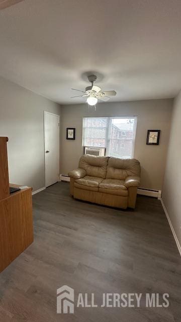 46 Gramercy Gdns, Middlesex, NJ 08846 - living area with a baseboard heating unit, baseboards, dark wood-style floors, and ceiling fan