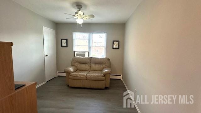 46 Gramercy Gdns, Middlesex, NJ 08846 - living area featuring a baseboard radiator, wood finished floors, a ceiling fan, and baseboards