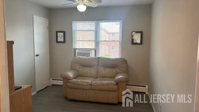 46 Gramercy Gdns, Middlesex, NJ 08846 - living area with baseboard heating, a ceiling fan, wood finished floors, and baseboards