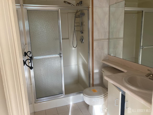 134 Hatfield Ln, East Brunswick, NJ 08816 - full bath with tile patterned floors, toilet, a shower stall, and vanity