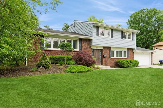 14 Agate Rd, East Brunswick, NJ 08816 - split level home featuring brick siding, a front yard, concrete driveway, and an attached garage