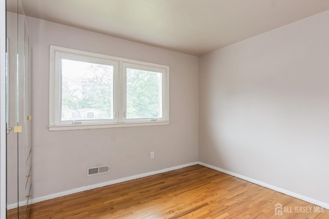 14 Agate Rd, East Brunswick, NJ 08816 - spare room featuring baseboards and wood finished floors