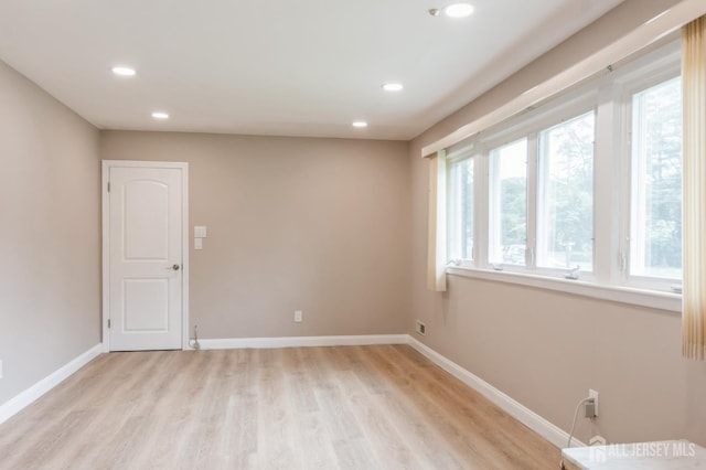 14 Agate Rd, East Brunswick, NJ 08816 - unfurnished room featuring light wood-type flooring, recessed lighting, and baseboards