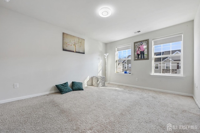 view of carpeted spare room