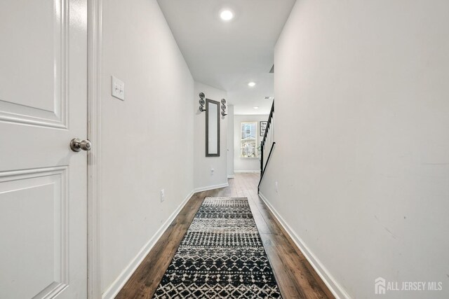 hall featuring dark hardwood / wood-style floors