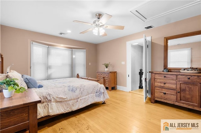 bedroom featuring ceiling fan and light hardwood / wood-style flooring