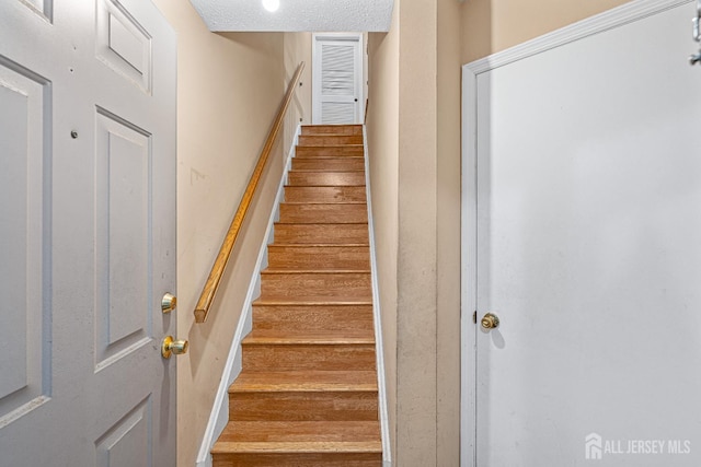 199 Prestwick Way, Edison, NJ 08820 - staircase featuring a textured ceiling