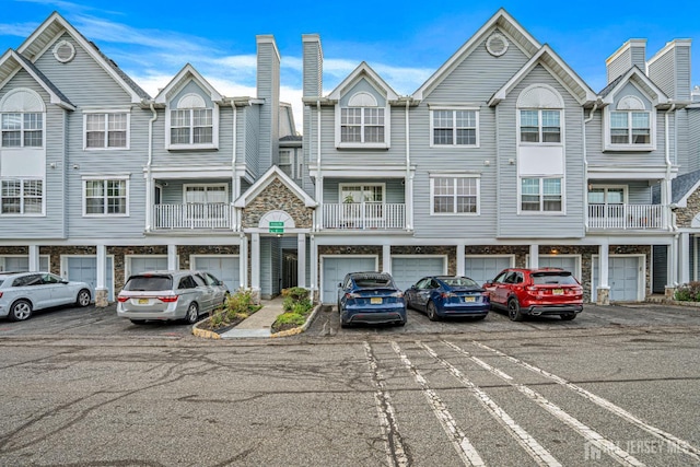 199 Prestwick Way, Edison, NJ 08820 - view of property featuring a chimney