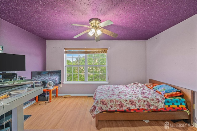 199 Prestwick Way, Edison, NJ 08820 - bedroom featuring wood finished floors, a textured ceiling, and a ceiling fan