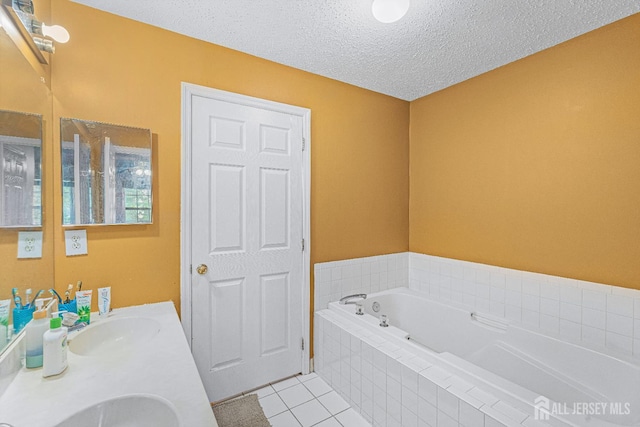 199 Prestwick Way, Edison, NJ 08820 - full bathroom featuring a garden tub, tile patterned flooring, double vanity, and a textured ceiling