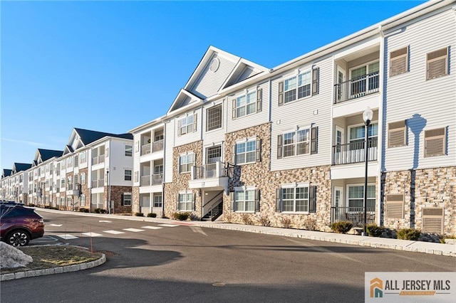 view of building exterior with a residential view