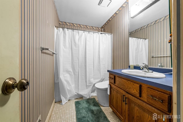 8 Carlisle Ct, Old Bridge, NJ 08857 - full bathroom with vanity, toilet, and tile patterned flooring