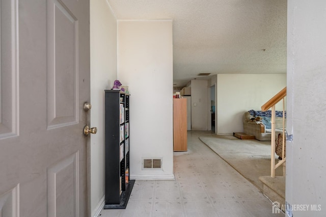 23 Newburgh Dr, Edison, NJ 08820 - entrance foyer with light flooring and a textured ceiling