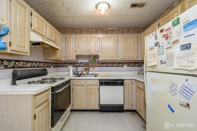 23 Newburgh Dr, Edison, NJ 08820 - kitchen with white appliances, light brown cabinetry, under cabinet range hood, light flooring, and a textured ceiling