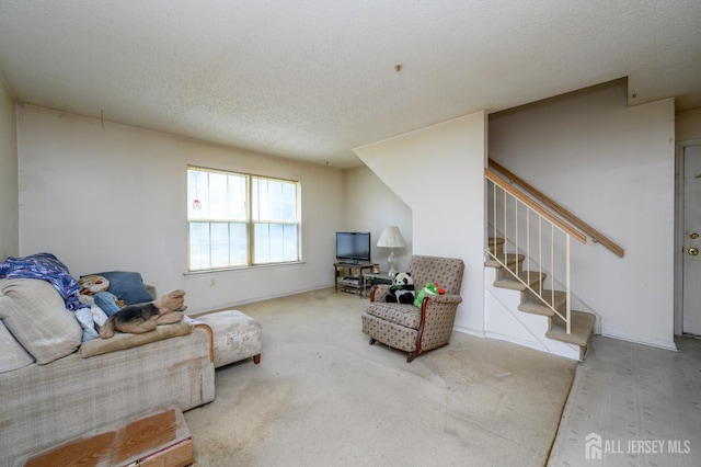 23 Newburgh Dr, Edison, NJ 08820 - carpeted living room featuring stairway and a textured ceiling
