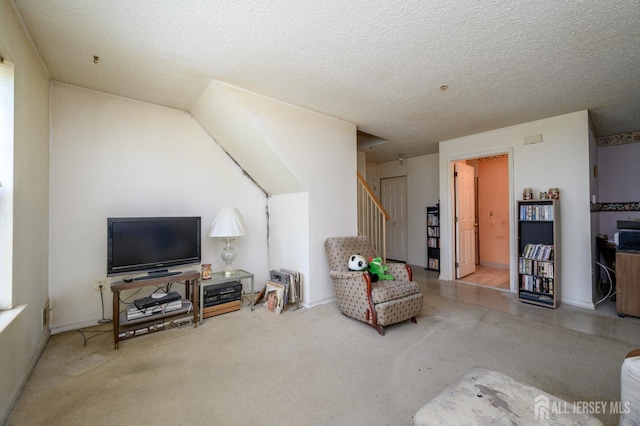 23 Newburgh Dr, Edison, NJ 08820 - carpeted living room featuring stairs and a textured ceiling