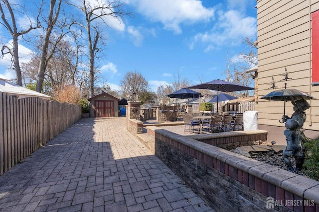 1135 Dorsey Pl, Plainfield, NJ 07062 - fenced backyard with a patio area