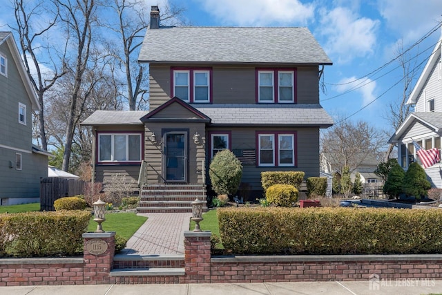 1135 Dorsey Pl, Plainfield, NJ 07062 - view of front facade featuring a chimney and a shingled roof