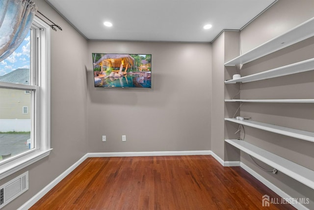 80 Sonora Ave, Iselin, NJ 08830 - empty room with wood finished floors, baseboards, healthy amount of natural light, and recessed lighting