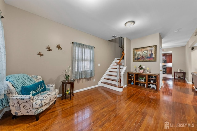 80 Sonora Ave, Iselin, NJ 08830 - sitting room featuring stairs, wood finished floors, and baseboards