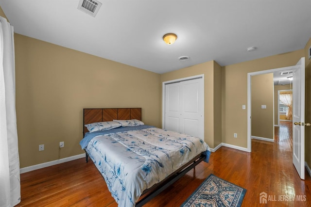 80 Sonora Ave, Iselin, NJ 08830 - bedroom with baseboards, wood finished floors, and a closet